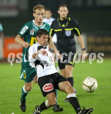 Fussball. Erste Liga. RZ Pellets WAC/St. Andrae gegen SC Austria Lustenau. Markus Kreuz, (WAC), Danijel Micic (Lustenau). Wolfsberg, 24.9.2010. 
Foto: Kuess

---
pressefotos, pressefotografie, kuess, qs, qspictures, sport, bild, bilder, bilddatenbank