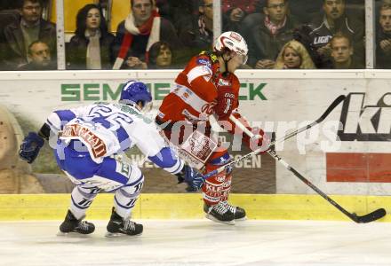 EBEL. Eishockey Bundesliga. KAC gegen KHL Medvescak Zagreb.  HUNDERTPFUND Thomas (KAC),  POWERS Christopher (Zagreb). Klagenfurt, am 26.9.2010.
Foto: Kuess 

---
pressefotos, pressefotografie, kuess, qs, qspictures, sport, bild, bilder, bilddatenbank