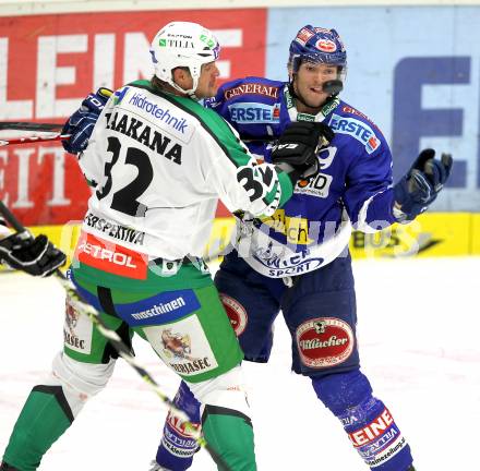 EBEL. Eishockey Bundesliga. EC Pasut VSV gegen Olimpija Ljubljana (Laibach). Benjamin Petrik, (VSV), Kari Haakana  (Ljubljana). Villach, am 8.10.2010.
Foto: Kuess 


---
pressefotos, pressefotografie, kuess, qs, qspictures, sport, bild, bilder, bilddatenbank