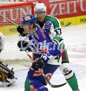 EBEL. Eishockey Bundesliga. EC Pasut VSV gegen Olimpija Ljubljana (Laibach). Michael Raffl,  (VSV), Ziga Pavlin (Ljubljana). Villach, am 8.10.2010.
Foto: Kuess 


---
pressefotos, pressefotografie, kuess, qs, qspictures, sport, bild, bilder, bilddatenbank