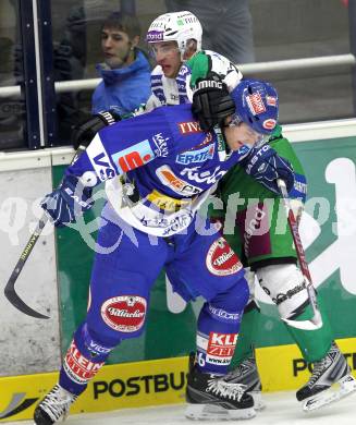 EBEL. Eishockey Bundesliga. EC Pasut VSV gegen Olimpija Ljubljana (Laibach). Jonathan Ferland,  (VSV), Bostjan Golicic (Ljubljana). Villach, am 8.10.2010.
Foto: Kuess 


---
pressefotos, pressefotografie, kuess, qs, qspictures, sport, bild, bilder, bilddatenbank