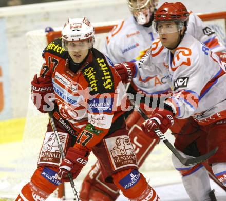 EBEL. Eishockey Bundesliga. KAC gegen HK Acroni Jesenice. Gregor Hager, (KAC), Mitja Robar (Jesenice). Klagenfurt, am 10.10.2010.
Foto: Kuess 

---
pressefotos, pressefotografie, kuess, qs, qspictures, sport, bild, bilder, bilddatenbank