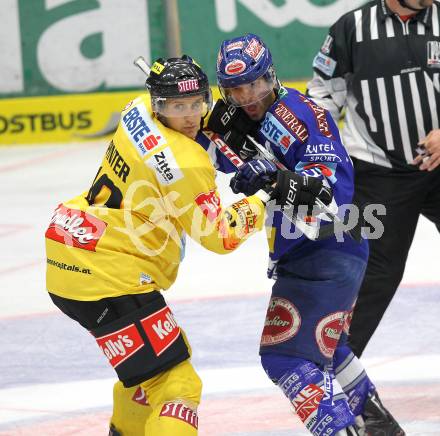 EBEL. Eishockey Bundesliga. EC Pasut VSV gegen EV Vienna Capitals.  Nikolas Petrik, (VSV), Philipp Pinter (Vienna). Villach, am 15.10.2010.
Foto: Kuess 


---
pressefotos, pressefotografie, kuess, qs, qspictures, sport, bild, bilder, bilddatenbank