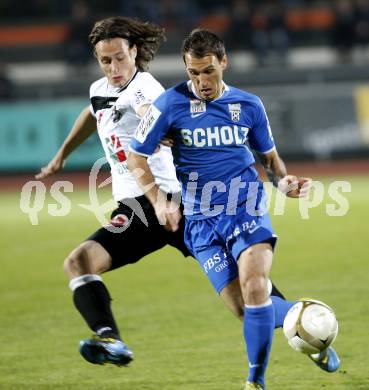 Fussball. Erste Liga. RZ Pellets WAC/St. Andrae gegen SV Scholz Groedig . Baldauf Dario (WAC), Jukic Mersudin (Groedig). Wolfsberg, 15.10.2010. 
Foto: Kuess

---
pressefotos, pressefotografie, kuess, qs, qspictures, sport, bild, bilder, bilddatenbank