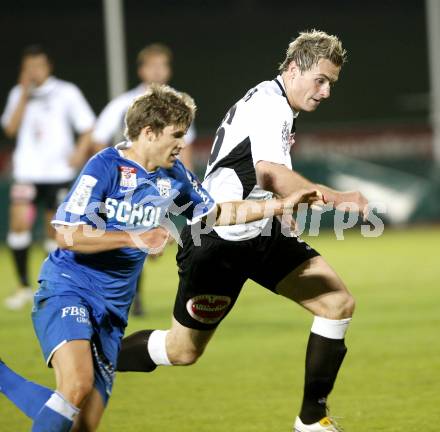 Fussball. Erste Liga. RZ Pellets WAC/St. Andrae gegen SV Scholz Groedig . Sollbauer Michael (WAC), Zulechner Philipp (Groedig). Wolfsberg, 15.10.2010. 
Foto: Kuess

---
pressefotos, pressefotografie, kuess, qs, qspictures, sport, bild, bilder, bilddatenbank