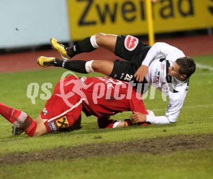 Fussball. Erste Liga. RZ Pellets WAC/St. Andrae gegen FC Lustenau 1907. Marco Sahanenk (Wolfsberg), Dejan Stojanovic (Lustenau). Wolfsberg, 22.10.2010.
Foto: Kuess 

---
pressefotos, pressefotografie, kuess, qs, qspictures, sport, bild, bilder, bilddatenbank