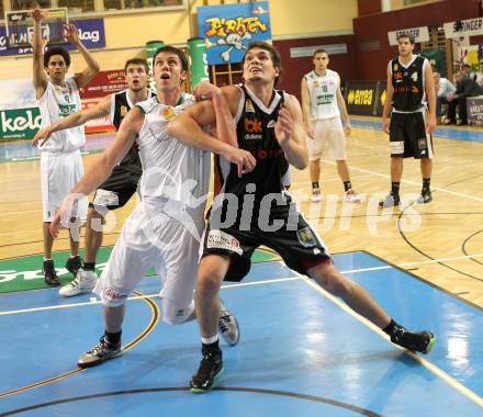 Basketball Bundesliga. Woerthersee Piraten gegen Xion Dukes Klosterneuburg.  Erik Rhinehart, (Piraten),   Christoph Greimeister (Klosterneuburg). Klagenfurt, 6.11.2010.
Foto:  Kuess

---
pressefotos, pressefotografie, kuess, qs, qspictures, sport, bild, bilder, bilddatenbank