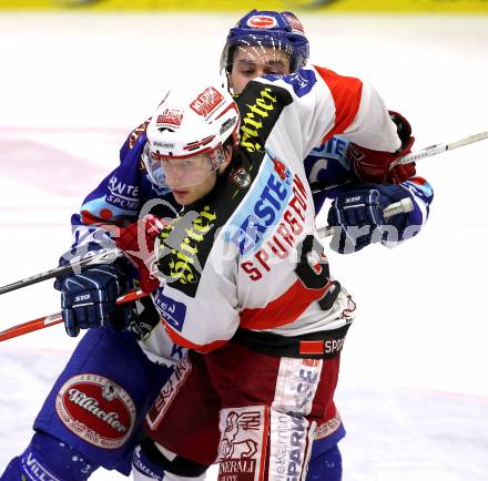 EBEL. Eishockey Bundesliga.  VSV gegen KAC. Jonathan Ferland,  (VSV), Tyler Spurgeon (KAC). Villach, am 7.11.2010.
Foto: Kuess 


---
pressefotos, pressefotografie, kuess, qs, qspictures, sport, bild, bilder, bilddatenbank