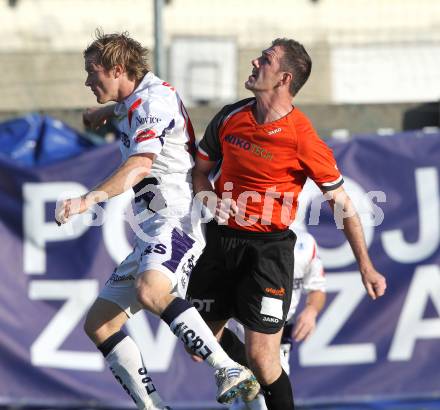 Fussball Regionalliga. SAK gegen ASK Stadtwerke Sparkasse Voitsberg. Christian Samitsch (SAK), Walther Eccher (Voitsberg). Klagenfurt, am 13.11.2010.
Foto: Kuess
---
pressefotos, pressefotografie, kuess, qs, qspictures, sport, bild, bilder, bilddatenbank