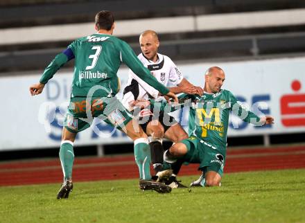 Fussball. Erste Liga. RZ Pellets WAC/St. Andrae gegen  SC Austria Lustenau. Stephan Stueckler, Peter Poellhuber, (WAC), Harald Duerr (Lustenau). Wolfsberg, 19.11.2010. 
Foto: Kuess

---
pressefotos, pressefotografie, kuess, qs, qspictures, sport, bild, bilder, bilddatenbank