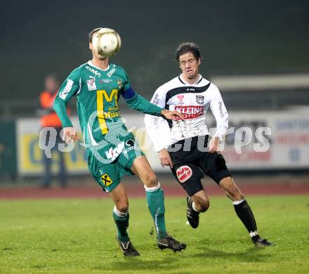 Fussball. Erste Liga. RZ Pellets WAC/St. Andrae gegen  SC Austria Lustenau. Christian Falk, (WAC), Peter Poellhuber (Lustenau). Wolfsberg, 19.11.2010. 
Foto: Kuess

---
pressefotos, pressefotografie, kuess, qs, qspictures, sport, bild, bilder, bilddatenbank