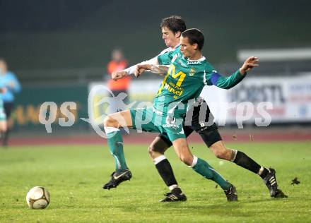 Fussball. Erste Liga. RZ Pellets WAC/St. Andrae gegen  SC Austria Lustenau. Christian Falk, (WAC), Peter Poellhuber (Lustenau). Wolfsberg, 19.11.2010. 
Foto: Kuess

---
pressefotos, pressefotografie, kuess, qs, qspictures, sport, bild, bilder, bilddatenbank