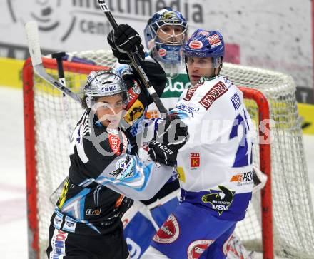 EBEL. Eishockey Bundesliga. EC Pasut VSV gegen EHC LIWEST Linz.  Greg Kuznik, (VSV), Matthias Schwab (Linz). Villach, am 3.12.2010.
Foto: Kuess 


---
pressefotos, pressefotografie, kuess, qs, qspictures, sport, bild, bilder, bilddatenbank