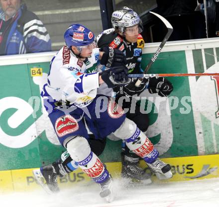 EBEL. Eishockey Bundesliga. EC Pasut VSV gegen EHC LIWEST Linz.  Michael Raffl, (VSV), Martin Grabher Meier (Linz). Villach, am 3.12.2010.
Foto: Kuess 


---
pressefotos, pressefotografie, kuess, qs, qspictures, sport, bild, bilder, bilddatenbank