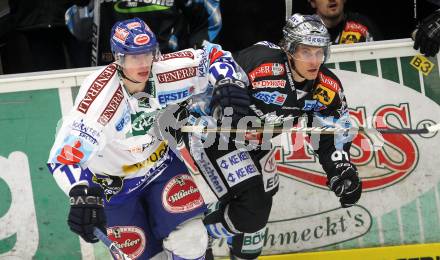 EBEL. Eishockey Bundesliga. EC Pasut VSV gegen EHC LIWEST Linz.  Michael Raffl, (VSV), Martin Grabher Meier (Linz). Villach, am 3.12.2010.
Foto: Kuess 


---
pressefotos, pressefotografie, kuess, qs, qspictures, sport, bild, bilder, bilddatenbank