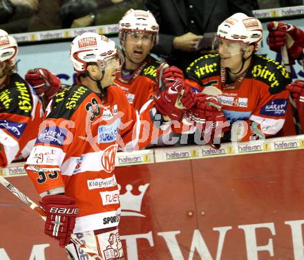 EBEL. Eishockey Bundesliga. KAC gegen HDD TILIA Olimpija Ljubljana. Torjubel Peter Ratchuk, Andrew Schneider, Kirk Furey (KAC). Klagenfurt, am 5.12.2010.
Foto: Kuess 

---
pressefotos, pressefotografie, kuess, qs, qspictures, sport, bild, bilder, bilddatenbank