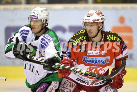 EBEL. Eishockey Bundesliga. KAC gegen HDD TILIA Olimpija Ljubljana. Johannes Kirisits, (KAC), Ales Music (Laibach). Klagenfurt, am 5.12.2010.
Foto: Kuess 

---
pressefotos, pressefotografie, kuess, qs, qspictures, sport, bild, bilder, bilddatenbank