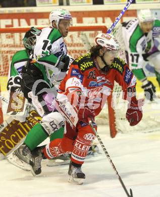 EBEL. Eishockey Bundesliga. KAC gegen HDD TILIA Olimpija Ljubljana. Raphael Herburger (KAC), Matej Hocevar (Laibach). Klagenfurt, am 5.12.2010.
Foto: Kuess 

---
pressefotos, pressefotografie, kuess, qs, qspictures, sport, bild, bilder, bilddatenbank