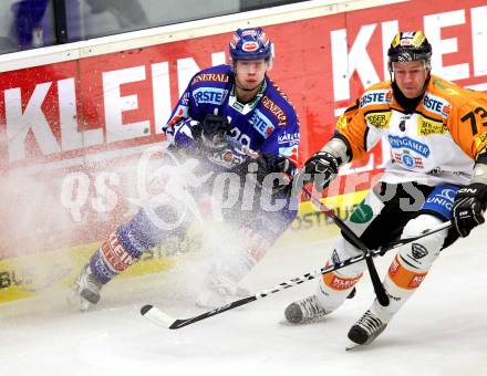 EBEL. Eishockey Bundesliga. EC Pasut VSV gegen  Graz 99ers. Michael Raffl,  (VSV), Nick Kuiper (Graz). Villach, am 10.12.2010.
Foto: Kuess 


---
pressefotos, pressefotografie, kuess, qs, qspictures, sport, bild, bilder, bilddatenbank