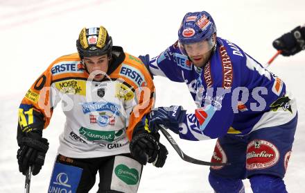EBEL. Eishockey Bundesliga. EC Pasut VSV gegen  Graz 99ers.  Derek Damon, (VSV), Warren Norris (Graz). Villach, am 10.12.2010.
Foto: Kuess 


---
pressefotos, pressefotografie, kuess, qs, qspictures, sport, bild, bilder, bilddatenbank