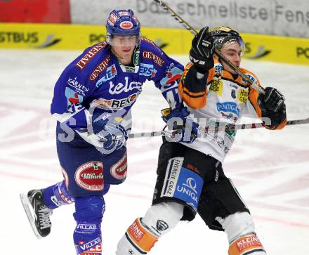 EBEL. Eishockey Bundesliga. EC Pasut VSV gegen  Graz 99ers. Mario Altmann,  (VSV), Michael Ouellette (Graz). Villach, am 10.12.2010.
Foto: Kuess 


---
pressefotos, pressefotografie, kuess, qs, qspictures, sport, bild, bilder, bilddatenbank