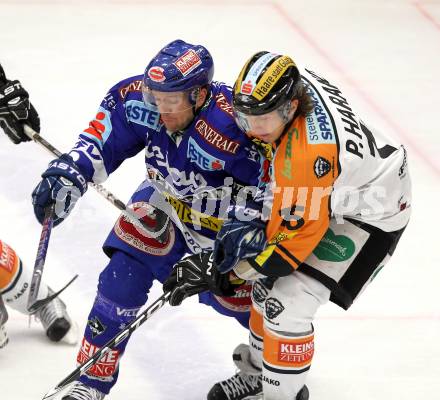 EBEL. Eishockey Bundesliga. EC Pasut VSV gegen  Graz 99ers. Roland Kaspitz, (VSV), Patrick Harand  (Graz). Villach, am 10.12.2010.
Foto: Kuess 


---
pressefotos, pressefotografie, kuess, qs, qspictures, sport, bild, bilder, bilddatenbank