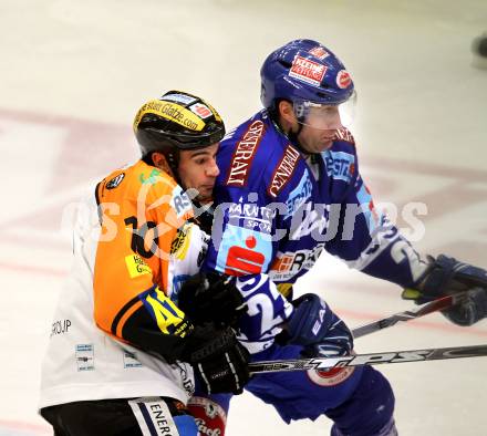 EBEL. Eishockey Bundesliga. EC Pasut VSV gegen  Graz 99ers.  Greg Kuznik, (VSV), Warren Norris (Graz). Villach, am 10.12.2010.
Foto: Kuess 


---
pressefotos, pressefotografie, kuess, qs, qspictures, sport, bild, bilder, bilddatenbank