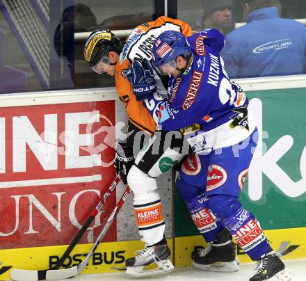 EBEL. Eishockey Bundesliga. EC Pasut VSV gegen  Graz 99ers.  Greg Kuznik, (VSV), Matthias Iberer (Graz). Villach, am 10.12.2010.
Foto: Kuess 


---
pressefotos, pressefotografie, kuess, qs, qspictures, sport, bild, bilder, bilddatenbank