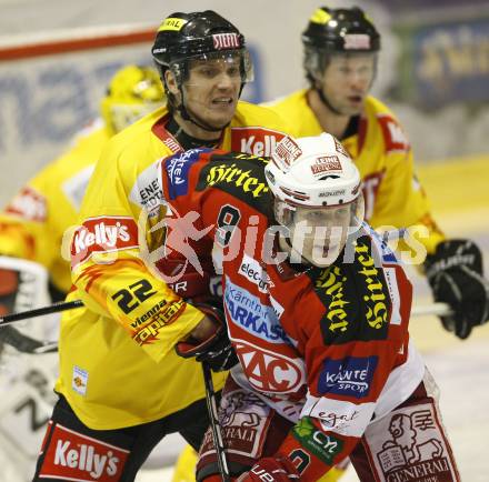 EBEL. Eishockey Bundesliga. KAC gegen EV Vienna Capitals. SPURGEON Tyler (KAC), RODMAN Marcel (Vienna). Klagenfurt, am 10.12.2010.
Foto: Kuess 

---
pressefotos, pressefotografie, kuess, qs, qspictures, sport, bild, bilder, bilddatenbank