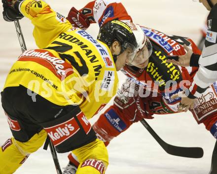 EBEL. Eishockey Bundesliga. KAC gegen EV Vienna Capitals. SCHULLER David (KAC), RODMAN David (Vienna). Klagenfurt, am 10.12.2010.
Foto: Kuess 

---
pressefotos, pressefotografie, kuess, qs, qspictures, sport, bild, bilder, bilddatenbank