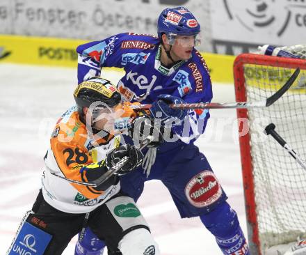 EBEL. Eishockey Bundesliga. EC Rekordfenster VSV gegen  Moser Medical Graz 99ers.  Mario Altmann (VSV), Michael Ouellette (Graz). Villach, am 10.12.2010.
Foto: Kuess 


---
pressefotos, pressefotografie, kuess, qs, qspictures, sport, bild, bilder, bilddatenbank