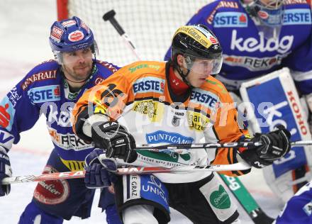 EBEL. Eishockey Bundesliga. EC Rekordfenster VSV gegen  Moser Medical Graz 99ers.  Kevin Mitchell (VSV), Patrick Harand (Graz). Villach, am 10.12.2010.
Foto: Kuess 


---
pressefotos, pressefotografie, kuess, qs, qspictures, sport, bild, bilder, bilddatenbank