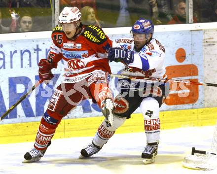 EBEL. Eishockey Bundesliga. KAC gegen VSV. David Schuller, (KAC), Gerhard Unterluggauer (VSV). Klagenfurt, am 21.12.2010.
Foto: Kuess 

---
pressefotos, pressefotografie, kuess, qs, qspictures, sport, bild, bilder, bilddatenbank