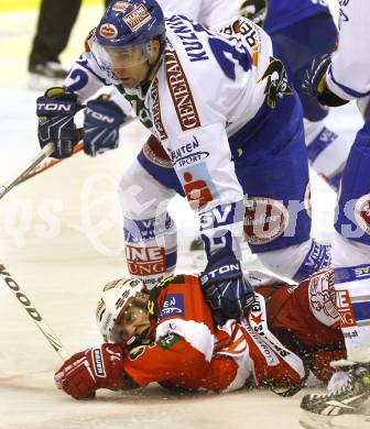 EBEL. Eishockey Bundesliga. KAC gegen VSV. Paul Schellander, (KAC), Greg Kuznik (VSV). Klagenfurt, am 21.12.2010.
Foto: Kuess 

---
pressefotos, pressefotografie, kuess, qs, qspictures, sport, bild, bilder, bilddatenbank