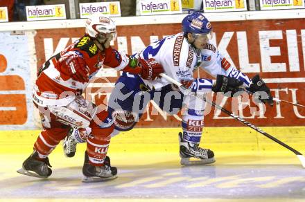 EBEL. Eishockey Bundesliga. KAC gegen VSV. Kirk Furey, (KAC), Michael Raffl (VSV). Klagenfurt, am 21.12.2010.
Foto: Kuess 

---
pressefotos, pressefotografie, kuess, qs, qspictures, sport, bild, bilder, bilddatenbank