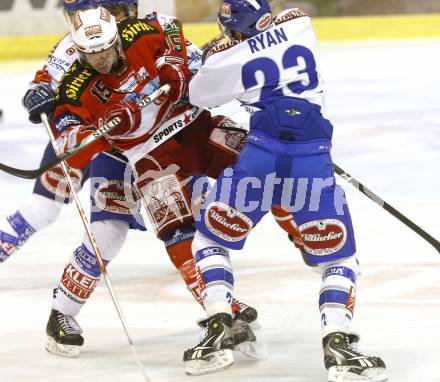 EBEL. Eishockey Bundesliga. KAC gegen VSV. Paul Schellander, (KAC), Matt Ryan (VSV). Klagenfurt, am 21.12.2010.
Foto: Kuess 

---
pressefotos, pressefotografie, kuess, qs, qspictures, sport, bild, bilder, bilddatenbank