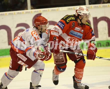 EBEL. Eishockey Bundesliga. EC KAC gegen HK Acroni Jesenice. SPURGEON Tyler (KAC), HAFNER Tomi (Jesenice). Klagenfurt, am 2.1.2011.
Foto: Kuess 

---
pressefotos, pressefotografie, kuess, qs, qspictures, sport, bild, bilder, bilddatenbank