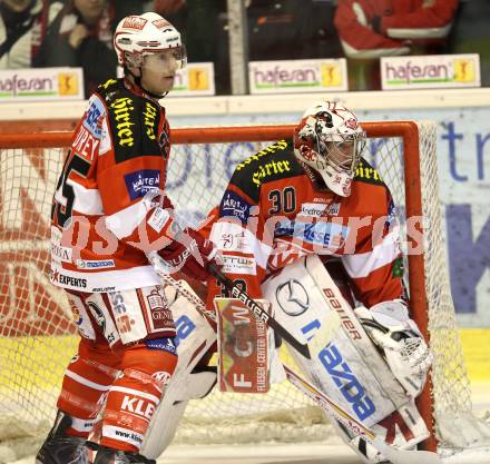 EBEL. Eishockey Bundesliga. EC KAC gegen HK Acroni Jesenice. FUREY Kirk, SWETTE Rene (KAC). Klagenfurt, am 2.1.2011.
Foto: Kuess 

---
pressefotos, pressefotografie, kuess, qs, qspictures, sport, bild, bilder, bilddatenbank