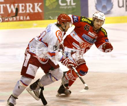 EBEL. Eishockey Bundesliga. EC KAC gegen HK Acroni Jesenice. SCHULLER David (KAC), HAFNER Tomi (Jesenice). Klagenfurt, am 2.1.2011.
Foto: Kuess 

---
pressefotos, pressefotografie, kuess, qs, qspictures, sport, bild, bilder, bilddatenbank