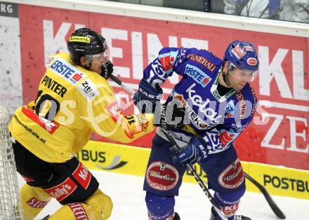 EBEL. Eishockey Bundesliga. EC Rekordfenster VSV gegen Vienna Capitals. Derek Damon, (VSV), Philipp Pinter (Vienna). Villach, am 4.1.2011.
Foto: Kuess

---
pressefotos, pressefotografie, kuess, qs, qspictures, sport, bild, bilder, bilddatenbank