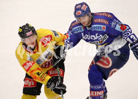 EBEL. Eishockey Bundesliga. EC Rekordfenster VSV gegen Vienna Capitals. Benjamin Petrik, (VSV), Jeremy Rebek (Vienna). Villach, am 4.1.2011.
Foto: Kuess

---
pressefotos, pressefotografie, kuess, qs, qspictures, sport, bild, bilder, bilddatenbank