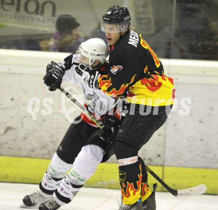 Eishockey Carinthian Hockey League. CHL. EC Tarco Woelfe gegen EC SV Spittal. Heiko Ofner (Tarco), Andreas Meixner (Spittal). Klagenfurt, am 5.1.2011.
Foto: Kuess
---
pressefotos, pressefotografie, kuess, qs, qspictures, sport, bild, bilder, bilddatenbank