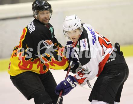 Eishockey Carinthian Hockey League. CHL. EC Tarco Woelfe gegen EC SV Spittal. Nick Kompain (Tarco), Peter Rossbacher (Spittal). Klagenfurt, am 5.1.2011.
Foto: Kuess
---
pressefotos, pressefotografie, kuess, qs, qspictures, sport, bild, bilder, bilddatenbank