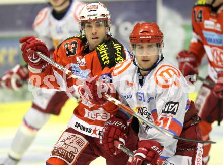 EBEL. Eishockey Bundesliga. EC KAC gegen HK Acroni Jesenice. Peter Ratchuk, (KAC), Mitja Robar (Jesenice). Klagenfurt, am 9.1.2011.
Foto: Kuess 

---
pressefotos, pressefotografie, kuess, qs, qspictures, sport, bild, bilder, bilddatenbank