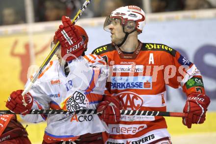 EBEL. Eishockey Bundesliga. EC KAC gegen HK Acroni Jesenice. Herbert Ratz, (KAC), Marjan Manfreda (Jesenice). Klagenfurt, am 9.1.2011.
Foto: Kuess 

---
pressefotos, pressefotografie, kuess, qs, qspictures, sport, bild, bilder, bilddatenbank