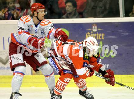 EBEL. Eishockey Bundesliga. EC KAC gegen HK Acroni Jesenice. Manuel Geier, (KAC), Marc Cavosie (Jesenice). Klagenfurt, am 9.1.2011.
Foto: Kuess 

---
pressefotos, pressefotografie, kuess, qs, qspictures, sport, bild, bilder, bilddatenbank