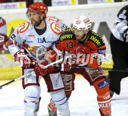 EBEL. Eishockey Bundesliga. EC KAC gegen HK Acroni Jesenice. Johannes Kirisits, (KAC), Brett Lysak (Jesenice). Klagenfurt, am 9.1.2011.
Foto: Kuess 

---
pressefotos, pressefotografie, kuess, qs, qspictures, sport, bild, bilder, bilddatenbank