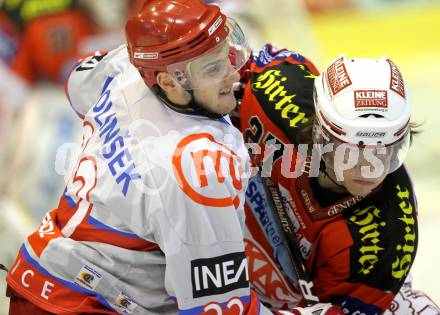 EBEL. Eishockey Bundesliga. EC KAC gegen HK Acroni Jesenice. Thomas HUndertpfund, (KAC), Jure Dolinsek (Jesenice). Klagenfurt, am 9.1.2011.
Foto: Kuess 

---
pressefotos, pressefotografie, kuess, qs, qspictures, sport, bild, bilder, bilddatenbank