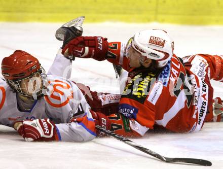 EBEL. Eishockey Bundesliga. EC KAC gegen HK Acroni Jesenice. Dieter Kalt, (KAC), Peter Bizalj (Jesenice). Klagenfurt, am 9.1.2011.
Foto: Kuess 

---
pressefotos, pressefotografie, kuess, qs, qspictures, sport, bild, bilder, bilddatenbank