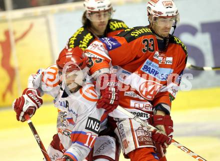 EBEL. Eishockey Bundesliga. EC KAC gegen HK Acroni Jesenice. Peter Ratchuk, (KAC), Brett Lysak (Jesenice). Klagenfurt, am 9.1.2011.
Foto: Kuess 

---
pressefotos, pressefotografie, kuess, qs, qspictures, sport, bild, bilder, bilddatenbank